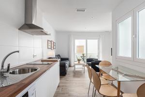 Kuchyňa alebo kuchynka v ubytovaní Apartamentos Wamba