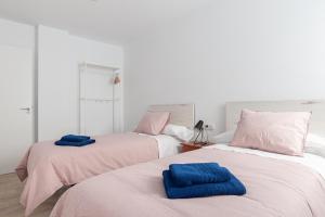 Posteľ alebo postele v izbe v ubytovaní Apartamentos Wamba