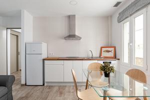 Kuchyňa alebo kuchynka v ubytovaní Apartamentos Wamba