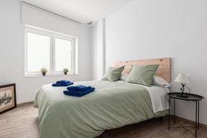Posteľ alebo postele v izbe v ubytovaní Apartamentos Wamba
