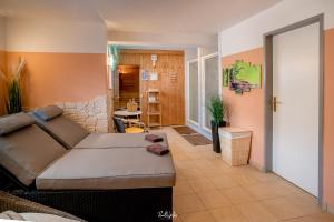 a living room with a couch and a table at Haus Isabella Obertauern in Obertauern