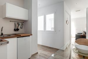 Kuchyňa alebo kuchynka v ubytovaní Apartamentos Wamba