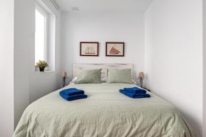 Posteľ alebo postele v izbe v ubytovaní Apartamentos Wamba