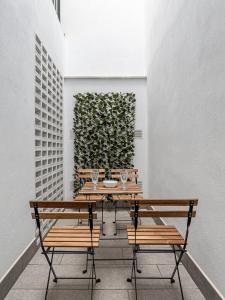 Posedenie v ubytovaní Apartamentos Wamba