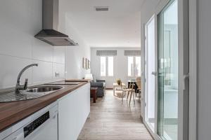 Kuchyňa alebo kuchynka v ubytovaní Apartamentos Wamba