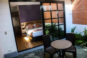 Krevet ili kreveti u jedinici u okviru objekta Hotel Poma Rosa