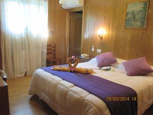 Łóżko lub łóżka w pokoju w obiekcie Hotel Playa Samil Vigo