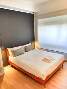 Ліжко або ліжка в номері E-Milan Rooms Zona Tortona