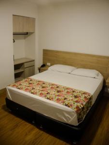 Krevet ili kreveti u jedinici u okviru objekta Hotel Poma Rosa