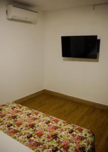Krevet ili kreveti u jedinici u okviru objekta Hotel Poma Rosa