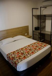 Krevet ili kreveti u jedinici u okviru objekta Hotel Poma Rosa