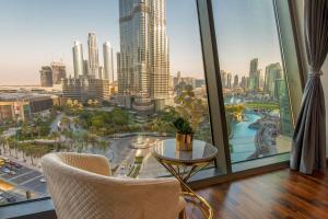 a view of a city from a hotel room at FIRST CLASS 3BR with full BURJ KHALIFA VIEW in Dubai