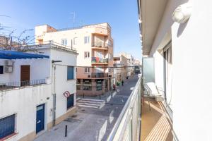 an apartment balcony with a view of a street at Apart-rent Apartamento Francesc Macia 1º 2002 in Roses