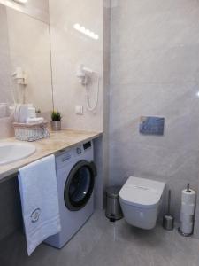 Kúpeľňa v ubytovaní Apartamenty Kapitańskie Kasprowicza 20A taras