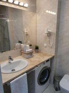 Kúpeľňa v ubytovaní Apartamenty Kapitańskie Kasprowicza 20A taras