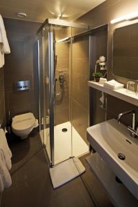 Phòng tắm tại Best Western Plus Hotel Zürcherhof