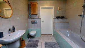 Kúpeľňa v ubytovaní A Mecsek Gyöngye Apartmanhaz