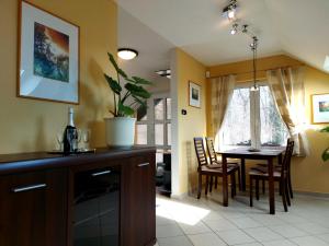 Kuchyňa alebo kuchynka v ubytovaní A Mecsek Gyöngye Apartmanhaz