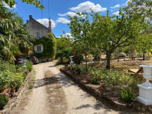 Zahrada ubytování Maison d'hôtes des Perrières