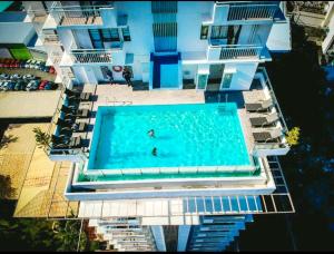 a swimming pool in the middle of a building at Cebu City Apartment - Mabolo Gardens in Cebu City