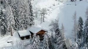 Wuidererhüttn, Charlet in Alleinlage mit freistehendem Saunahaus durante l'inverno