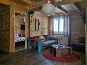 Una cama o camas en una habitación de Šum Apartmani - Stara planina