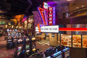 a casino with a lot of slot machines at Hard Rock Hotel & Casino Tulsa in Tulsa