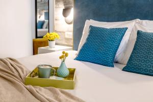 Postel nebo postele na pokoji v ubytování Metulla Travel Hotel
