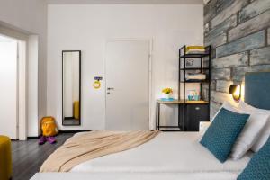 Postel nebo postele na pokoji v ubytování Metulla Travel Hotel