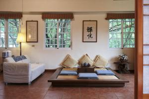 Zona d'estar a Wisdom Garden Home Stay
