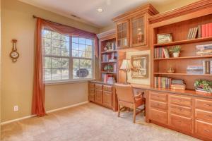 a home office with a desk and a window at Peaceful in the Parks in Bend
