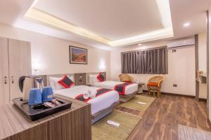 Voodi või voodid majutusasutuse Hotel Wawa toas
