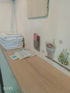 Voodi või voodid majutusasutuse Zhiben hotspring Heping Guesthouse toas