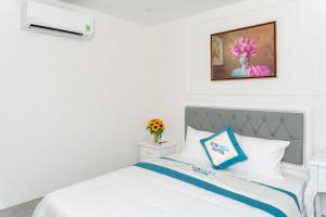 Postel nebo postele na pokoji v ubytování Sun Hill Hotel