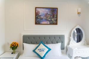 Postel nebo postele na pokoji v ubytování Sun Hill Hotel
