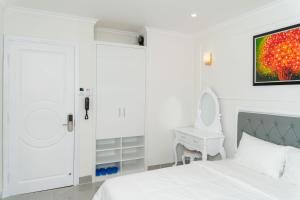 Postel nebo postele na pokoji v ubytování Sun Hill Hotel