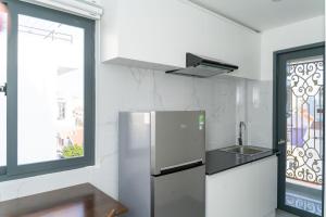 Kuchyň nebo kuchyňský kout v ubytování Sun Hill Hotel
