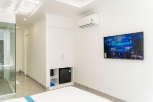 TV a/nebo společenská místnost v ubytování Sun Hill Hotel