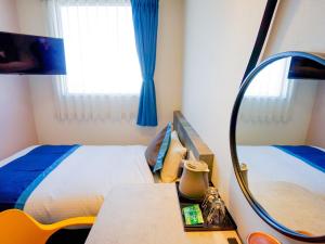 Sjónvarps- og/eða afþreyingartæki á Hotel Area One Ise Inter
