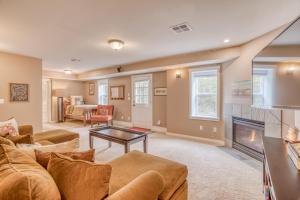 a living room with a couch and a fireplace at Coastal Bliss in Lincoln City