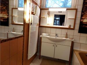 Kúpeľňa v ubytovaní A Mecsek Gyöngye Apartmanhaz
