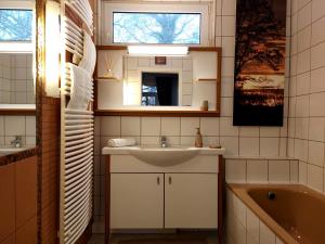 Kúpeľňa v ubytovaní A Mecsek Gyöngye Apartmanhaz