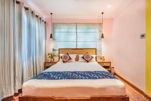 Tempat tidur dalam kamar di Stilly Inn