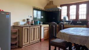 Kuchyň nebo kuchyňský kout v ubytování Budhanilkantha Luxury Apartment