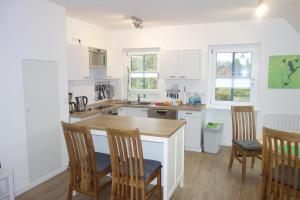 Kuchyň nebo kuchyňský kout v ubytování Meerzeit + 12 fotografií