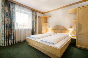 Voodi või voodid majutusasutuse Apartpension Kappacher toas