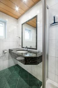 Vannituba majutusasutuses Apartpension Kappacher