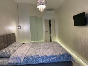 Posteľ alebo postele v izbe v ubytovaní Panorama Luxury Apartment in The House with a Spire, a historical building in the city centre