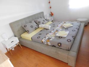 Postel nebo postele na pokoji v ubytování Apartmani Ruža