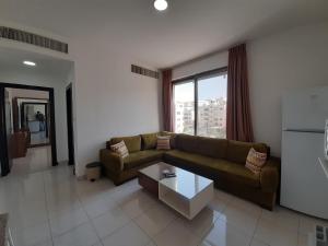 Zona de estar de Furnished Apartments Near McDonald's Al-Madina Al-Monawara St